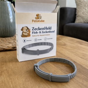 Fellstube ZeckenHeld Zeckenband frisch ausgepackt neben der Verpackung