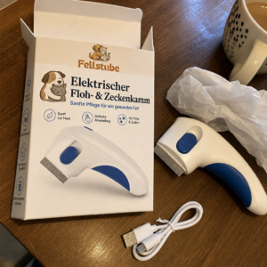 Fellstube elektrischer Floh- und Zeckenkamm frisch ausgepackt mit USB-Kabel